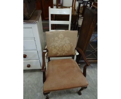A tapestry upholstered carver chair on carved and moulded cabriole front legs together with a white painted rush seated rocki