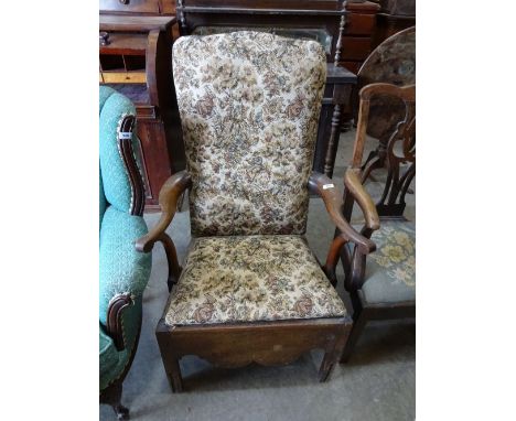 A tapestry upholstered commode chair