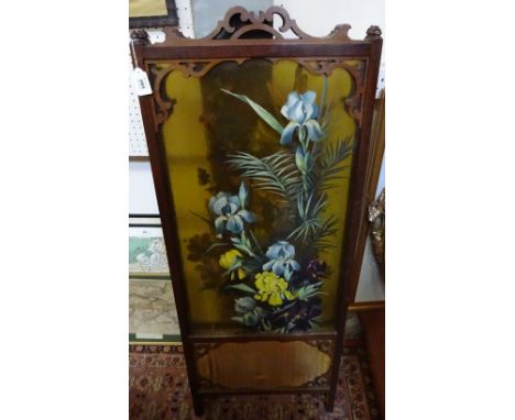 A three fold screen with hand painted floral glass panels over fabric panelled base, carved and moulded top rails and shaped 