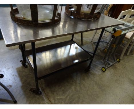 A steel kitchen work table with stretcher shelf, 122cm x 77cm