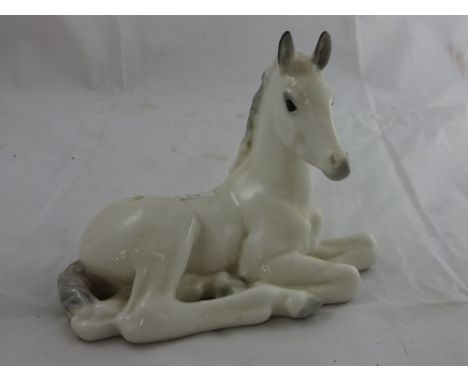 A Russian ceramic figure, horse at rest 