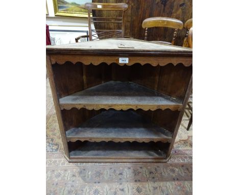 A small three shelf wall hanging corner unit, 72cm high