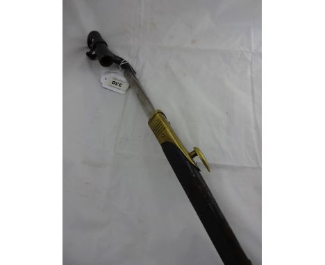 A bayonet in leather scabbard with brass mounts engraved 1290 728, 65.5cm