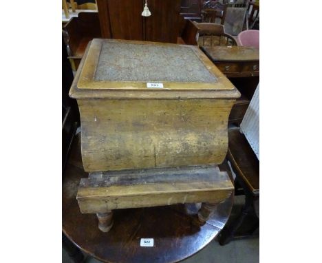 A lift top commode 