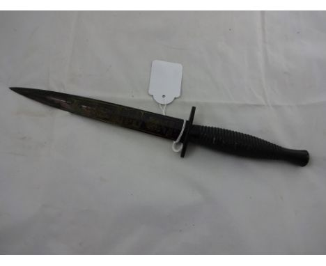 A wilkinson commando knife commemorating the Falklands War