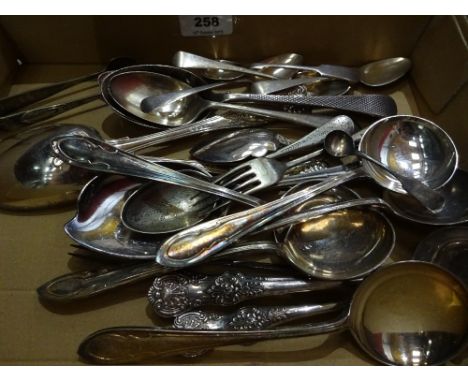 Six serving spoons, pickle fork, three small ladles, five soup spoons, two spoons and fork, teaspoons etc.