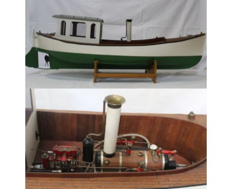 A large scale wooden model steam launch, painted in green &amp; white, fitted with a Futaba rip max FD14 M servos, a 6M serie