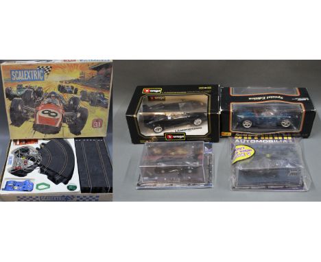 A Triang Scalextric sports set 31, two 1:18 scale diecast model cars by Burago &amp; 2 Bateman Automobillia collectable Batmo