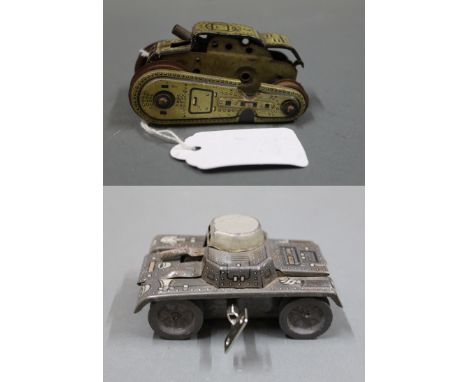 2 clockwork tin plate army tanks, to include a lithographed DRGM  T56 Gama tank  