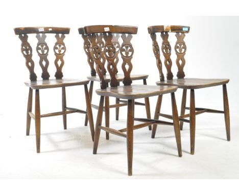 Ercol - Set of four Fleur De Lys vintage 20th century elm dining chairs. Model number 375 on saddle seat with tapering suppor