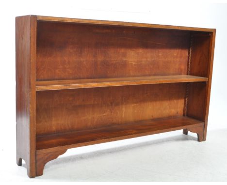 An early 20th century mahogany open window bookcase. Rectangular form with adjustable shelf raised on bracket feet.85 x 140 x