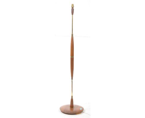 British Modern Design - A mid century teak and brass floor standing standard lamp. Light fixing to top, brass central column 