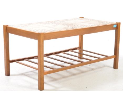 British Modern Design - A mid century teak wood and tile top long john coffee table. The rectangular table top with tile inse