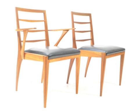 McIntosh of Kirkcaldy - Two vintage 20th century teak dining chairs. Ladder back with black vinyl drop in padded seats, taper