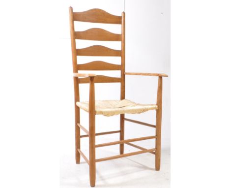 Arts &amp; Crafts style Cotswold country pass thru armchair in the manner of Neville Neal. Ash construction with rush sheet, 