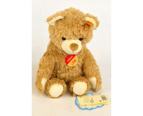 A Steiff teddy bear, no.022760, with yellow and red tag to ear and Steiff swing tag with beige/blonde fur and beany bottom, h