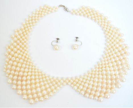 A cultured pearl bead collar shaped choker necklace and a pair of matching 9ct white gold mounted ear clips (2).