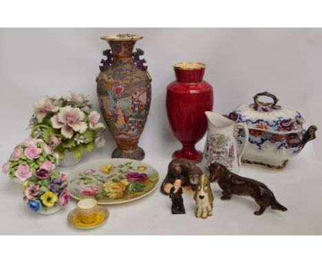 A group of decorative ceramics including a Royal Worcester cup and saucer, flower display, 19th century jug inscribed "SB 186