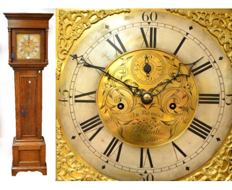 A George III oak longcase clock, the caddy top above brass dial set with silvered chapter ring with Roman numerals inscribed 