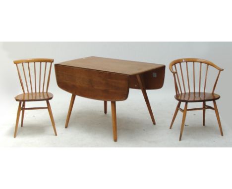 An Ercol dropleaf dining table, 112 x 123cm when extended, two elbow chairs and a further chair (4).