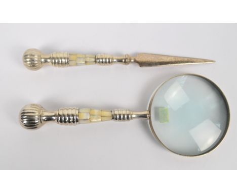 A white metal and mother of pearl handled magnifying glass, length 26cm, and a matching letter opener (2).