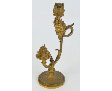 A decorative ormolu early electric table lamp with cast mask and fruit basket, on circular spreading bead decorated base, hei