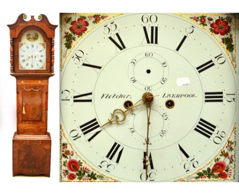 An early 19th century mahogany and inlaid longcase clock, the broken swan neck pediment above repainted dial inscribed "Fletc