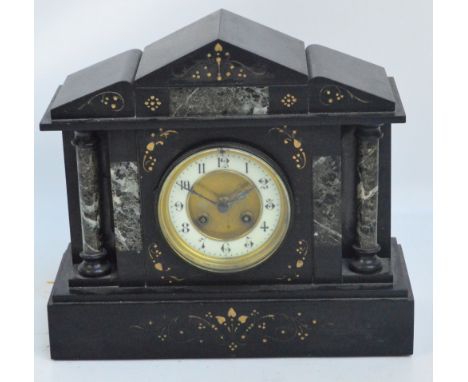 A late 19th century French black slate and marble set mausoleum type mantel clock with circular dial set with Arabic numerals