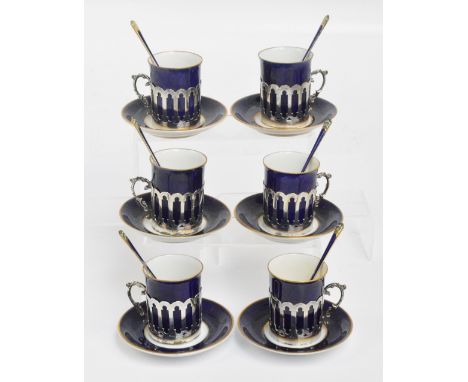 A set of six George VI hallmarked silver mounted George Jones & Sons Crescent China cobalt blue and white porcelain coffee ca