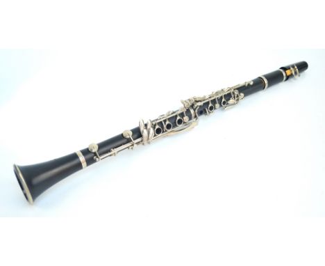 A cased "Elkhart, USA" clarinet.