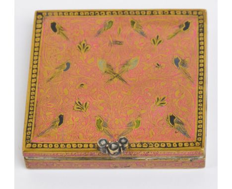 A square sectioned enamel decorated compact, the hinged lid decorated with birds amongst scrolls, with three old cut diamonds