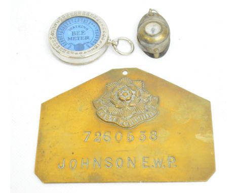 A vintage boxed chrome cased Swatkins "B Meter" with manual, a brass folding magnifying glass with compass to one side of the