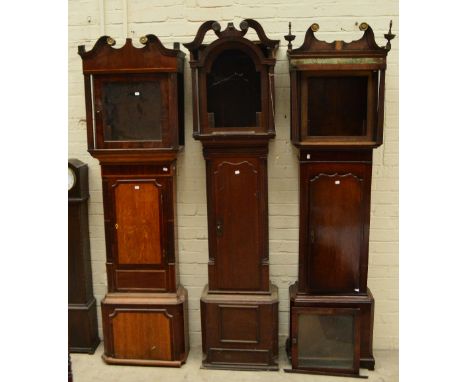 Three early 19th century oak longcase clock cases, for restoration.