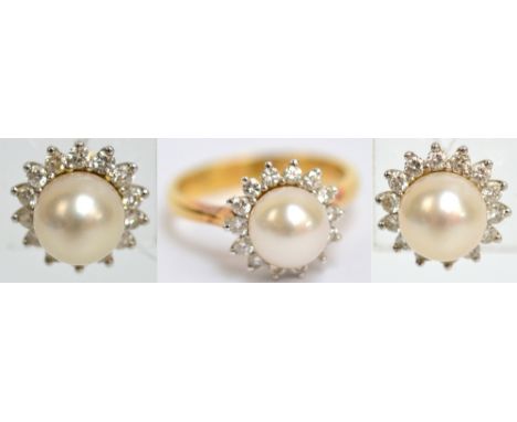 An 18ct yellow gold dress ring with a central cultured pearl surrounded by fourteen small diamonds, size N and a matching pai