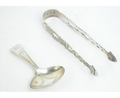 A George III hallmarked silver caddy spoon with oval bowl and bright cut decoration initialled MH to the finial, Samuel Godbe