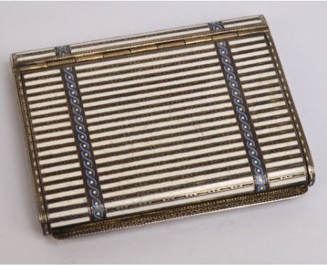 A late 19th/early 20th century Austro-Hungarian 900 standard silver small cigarette case with white enamel stripes and blue s