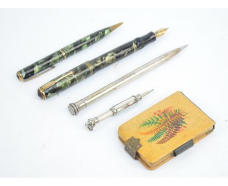 A vintage Parker green marble effect "Vacumatic" fountain pen with a matching propelling pencil, a hallmarked silver Wahl "Ev