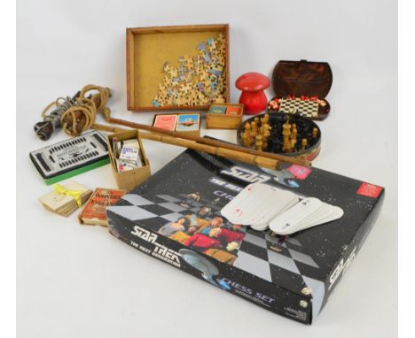 A collection of various vintage games to include playing card sets and part sets, a boxed Autobridge game, a Staunton chess s