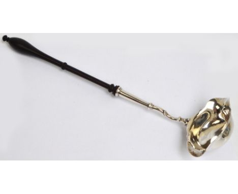 A George II hallmarked silver toddy ladle with oval two lipped bowl with shaped rim and S-scroll decorated stem with turned w