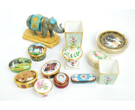 A collection of various predominantly ceramic pill/trinket boxes comprising four Royal Worcester examples, one modelled as an