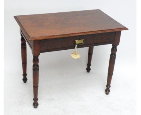 A late Victorian walnut rectangular side table with single drawer raised on engine turned legs to squat peg feet, height 70cm