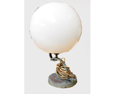 An Art Deco style table lamp with large globular white opaque glass shade on a geometrically stylised chromed base, height 48