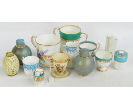 A collection of various Royal Worcester porcelain ware to include a pair of blue glazed globular jars and covers with gilt he