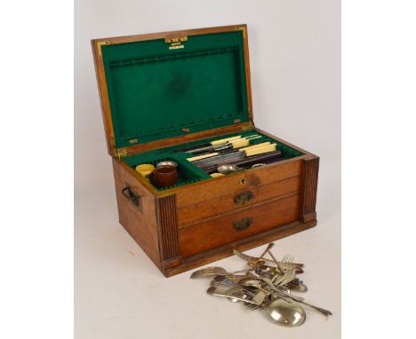 An oak green baize lined canteen containing a small group of Elkington & Co electroplated flatware including a soup ladle, sa