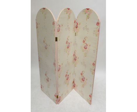 A contemporary floral fabric decorated three panel two fold dome topped screen, height 168cm.