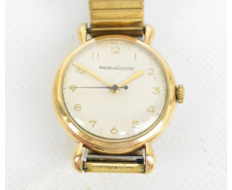 JAEGER-LE-COULTRE; a 9ct yellow gold cased manual wind gentleman's wristwatch, the circular dial set with Arabic numerals, th