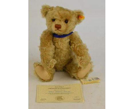 A Steiff 2004 teddy bear, no.661365, retailed by Danbury Mint, with yellow and red tag to ear and Steiff swing tag, with gold