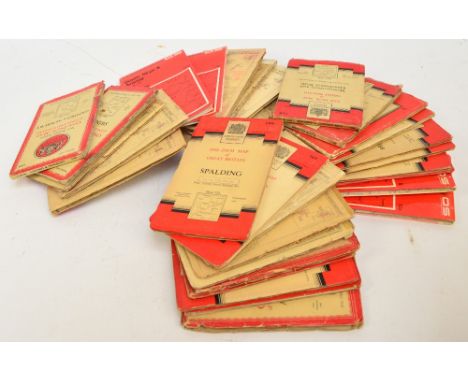 A collection of various vintage Ordnance Survey road maps, also a group of travelling and English countryside related books t
