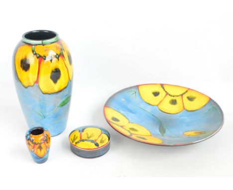 Four pieces of modern Poole "Wild Poppy" pattern decorated pieces comprising a large ovoid vase, height 33.5cm, a smaller exa