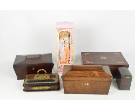 An early Victorian rosewood sarcophagus tea caddy, 32 x 17cm, a similar mahogany example, a mother of pearl inlaid writing sl